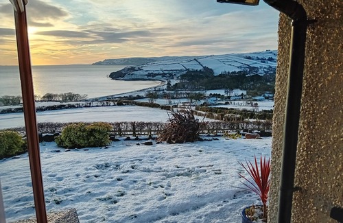 Cushendun Casa | Traditional 5 bedroom house overlooking Cushendun bay. Pet friendly.