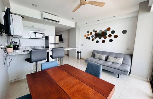 Zona Dorada Apartamento | pie de playa y con vista al mar by Gpsrentas