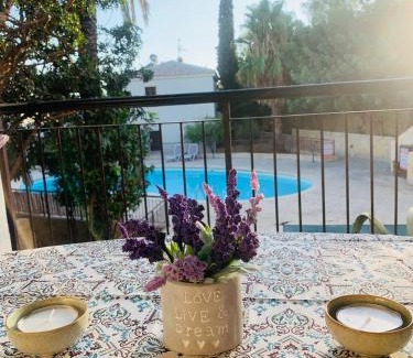 Mazotos Apartamento | Tranquil Poolside apartment with stunning views