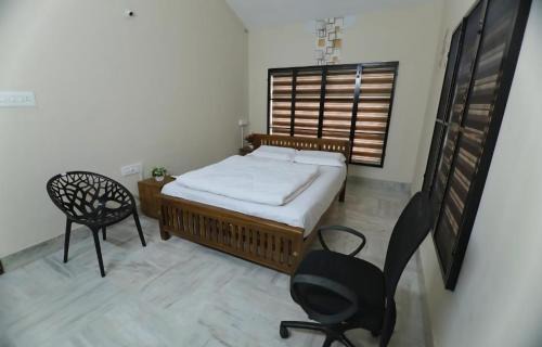 Thrissur Apartamento | Tranquil Rest House