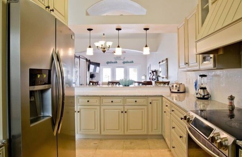 Sunset Pass Villa | Tranquil Retreat: Walk Out to Banana Bay White Sand Beach on the Intracoastal