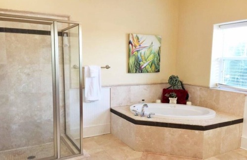Sunset Pass Villa | Tranquil Retreat: Walk Out to Banana Bay White Sand Beach on the Intracoastal