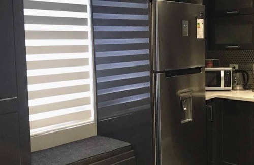 Downtown Apartamento | Tranquility Hotel Suite RB, walking distance to the QPS, Ariapita Ave, & EV Zoo,