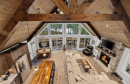 Lac du Flambeau Casa | Tranquility Point | LUX lakefront retreat, private dock, firepit, kayak, & AC