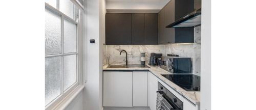 Faraday Apartamento | Tranquility Touchdown: Your London Sanctuary