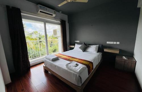 Nedumbassery Apartamento | Transit suites by Habitat