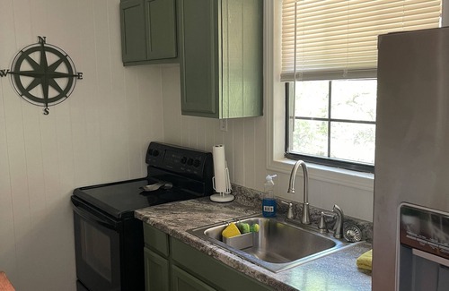 Marble Falls Cabaña | Traveler Creek Inn nestled in the woods