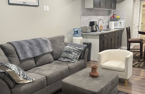 Stony Plain Casa | Tree facing back yard walkout unit at stony plain