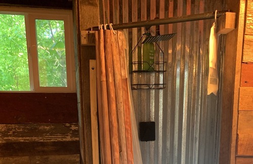 Jonesborough Cabina | Tree house themed tiny house in a tiny house community mountain retreat.