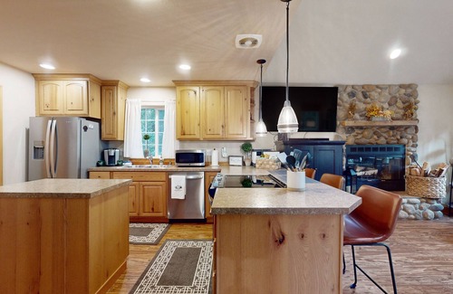 Anderson Island Casa | Tree-lined Anderson Island home with porch & fenced yard, near dock/tennis
