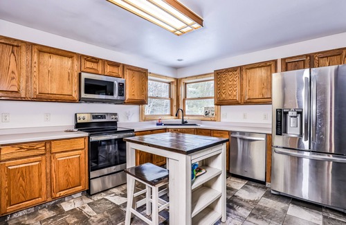 Mercer Casa | Tree-lined home with gas grill, firepit, & fireplace - walk to lake