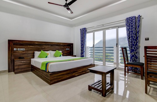 Kannan Devan Hills Hotel | Treebo Trend Misty Garden Resorts With Mountain View