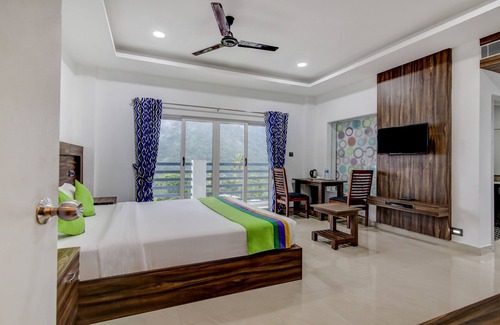 Kannan Devan Hills Hotel | Treebo Trend Misty Garden Resorts With Mountain View