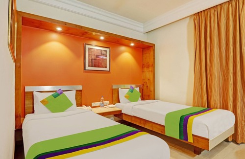 Stage 1 Hotel | Treebo Suraksha Inn