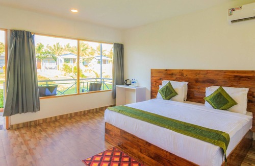 Morjim Hotel | Treebo Trend Lands End Beach Resort