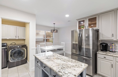 North Central Carrollton Casa | Trendy Home with Heated Pool and Game Room