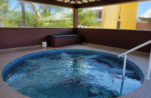 Barra Nova Apartamento | Triple room with air conditioning and hammock on the balcony