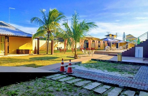 Barra Nova Apartamento | Triple room with air conditioning and hammock on the balcony