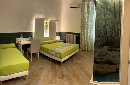 Giovinazzo Cama Y Desayuno | Habitación triple en B & b a tiro de piedra del mar