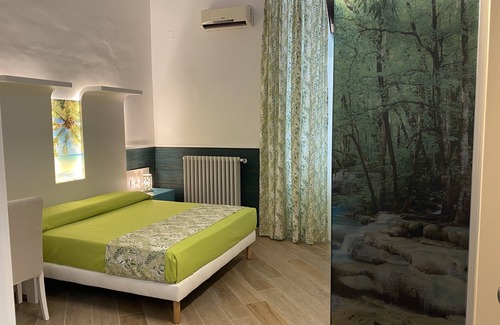 Giovinazzo Cama Y Desayuno | Habitación triple en B & b a tiro de piedra del mar