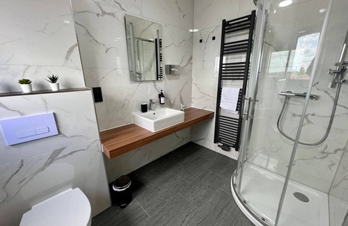 Weiskirchen Apartamento | Triple room - JUNIPRO Hotel Schinderhannes