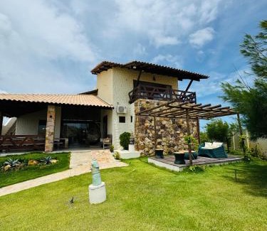 Coqueiro Casa | Triplex frente mar, com rooftop, piscina e jacuzzi!