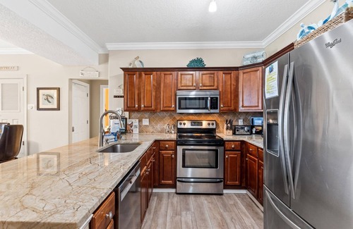 West Panama City Beach Condominio | Tropic Winds by Panhandle Getaways