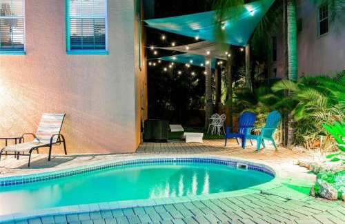 Holmes Beach Casa | Tropical luxury pool home by the beach with roof top lounge centrally located on Anna Maria Island