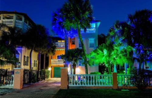 Holmes Beach Casa | Tropical luxury pool home by the beach with roof top lounge centrally located on Anna Maria Island