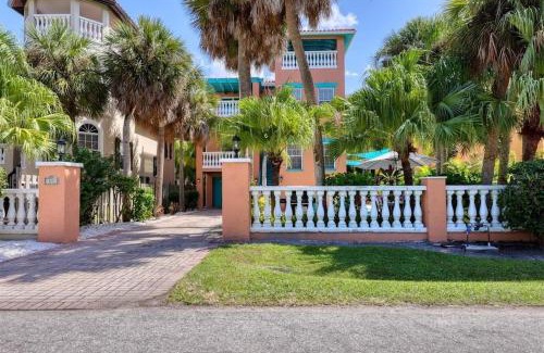 Holmes Beach Casa | Tropical luxury pool home by the beach with roof top lounge centrally located on Anna Maria Island