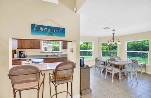 Vero Beach Casa | Tropical Paradise 4-bedroom house, Heated Pool, Games in lovely Vero Beach