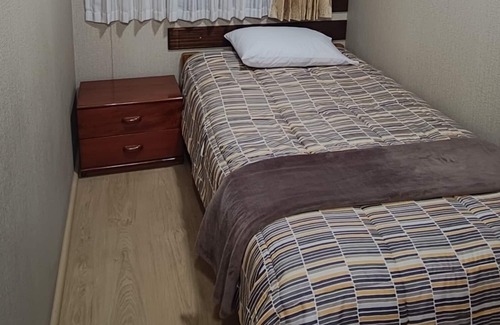 Distrito de Cerro Colorado Apartamento | Tu Hogar Acogedor en la Ciudad con Estacionamiento Gratuito