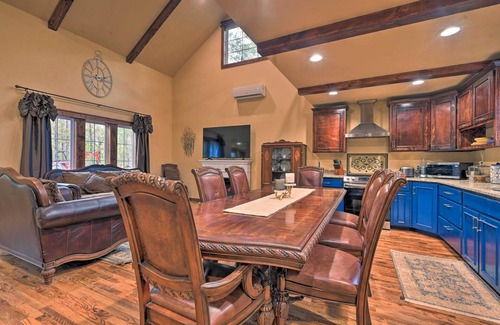 Broken Bow Cabaña | Tudor-Style Broken Bow Cottage w/ Hot Tub & Decks!