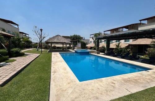 Jimenez Apartamento | Tulipanes Pool AC WiFi