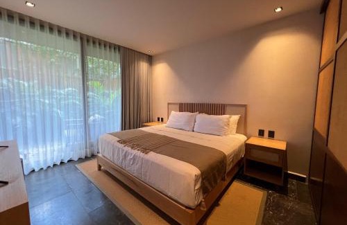 Playa Paraiso Apartamento | Tulum 2BR Jacuzzi Privado Lujo & Piscinas Humana 800m Playa