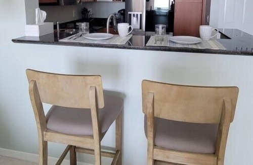Lantana Condominio | Turnkey Tranquility in Lantana with Marina and Intracoastal views!