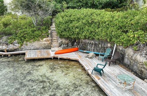 Ocean Point Villa | Turquoise Waterfront 5 Bedroom Rustic Villa