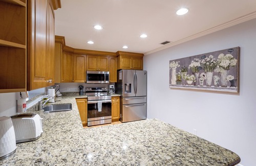 Boynton Beach Casa | Coastal Inspired home with heated saltwater pool & spa.