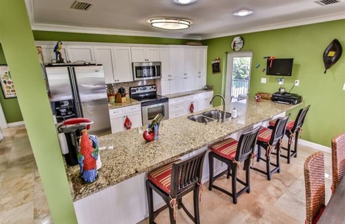 Marathon Casa | Turtle Time - Beautiful waterfront home with pool, dock and tropical landscaping