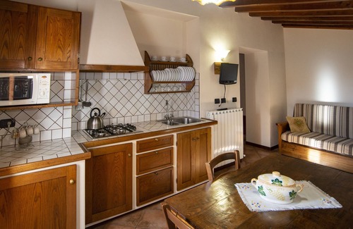 Pieve Fosciana Cabaña | Tuscan cottage with infinity pool, pizza oven, near restaurant on eco-farm