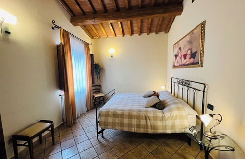Pieve Santo Stefano Otro | Tuscan getaway: pool, lake view & warm family hospitality in organic farmhouse