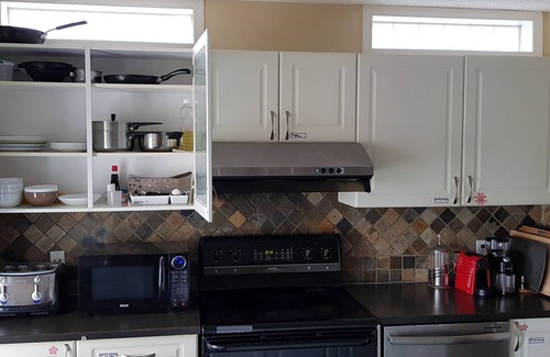 Tuscany Casa | Tuscan Ridge Guesthouse Calgary West
