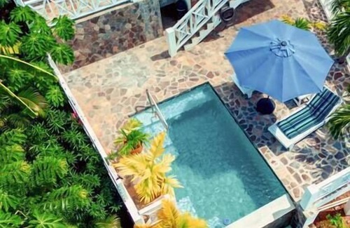 Princess Margaret Bay Casa | Two Apartment Beachview Home w/Pool