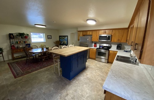 Mount Ida Casa | Two bedroom House with fenced in yard, covered patio area, located at the Joplin Inn at the entrance to Mountain Harbor, just 1 1/2 miles from Lake Ouachita. by RedAwning