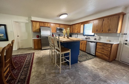 Mount Ida Casa | Two bedroom House with fenced in yard, covered patio area, located at the Joplin Inn at the entrance to Mountain Harbor, just 1 1/2 miles from Lake Ouachita. by RedAwning