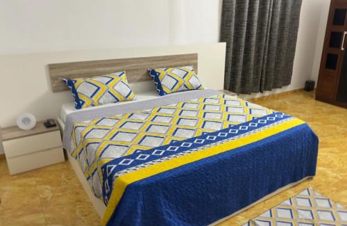 Lome Villa | Two bedroom living room single courtyard villa