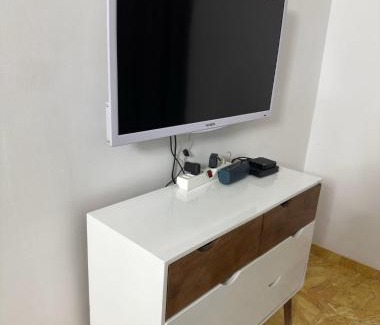 Lome Villa | Two bedroom living room single courtyard villa
