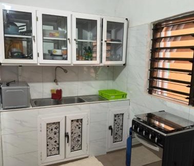 Lome Villa | Two bedroom living room single courtyard villa