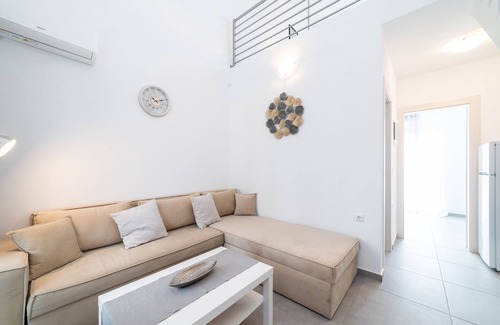 Paralia Ofryniou Villa | Two - Bedroom Loft with Pool Access, in Perla Residential Complex