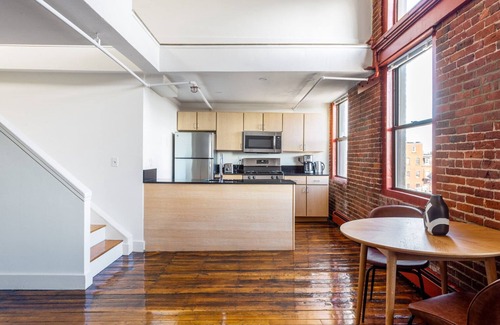 South End Casa | Two-level South End Loft w/ Pool, Art Gallery, Steps to T by Blueground